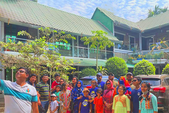 Navy Officers in front of Sampan Resort with Their Family